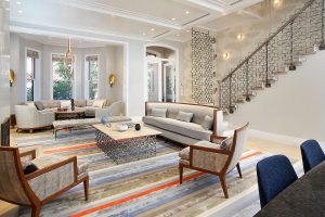 There are multiple seating areas and a designated dining area that can easily accommodate a table for twelve, all overlooking historic Marlborough Street in Lower Back Bay.
