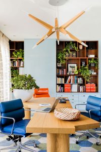 Adjacent to the library and media room is the family study, equipped with built-in work stations, and bespoke shelving.