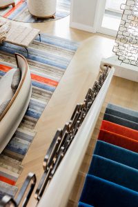 Entry to this stunning home is through a double set of doors into the original restored marble foyer.